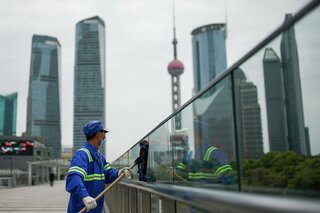 中国の習近平国家主席、債務抱える地方政府支援を表明ー決定文書